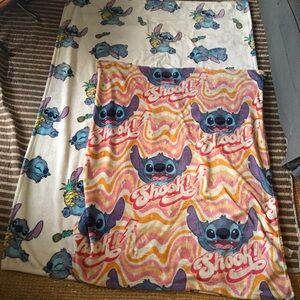 Disney stitch bundle of blankets.